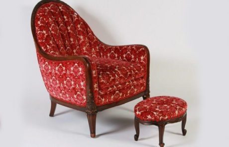 Walnut arm chair with floral upholstery, c. 1930.