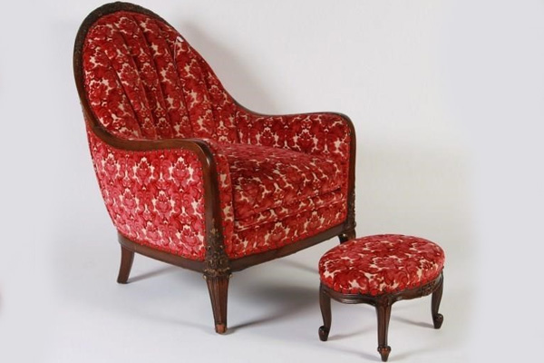 Walnut arm chair with floral upholstery, c. 1930.
